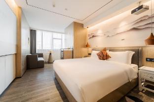 Baigao Elegant Hotel Longdong Botanical Garden Metro Station Branch