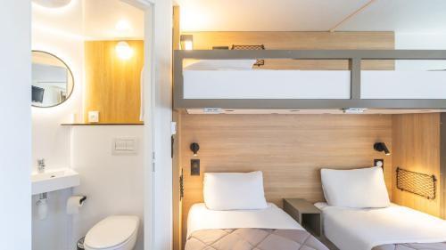 Premiere Classe Villepinte Centre - Parc des Expositions Room Type - Standard Room - 2 Single Beds 1 Bunk Bed