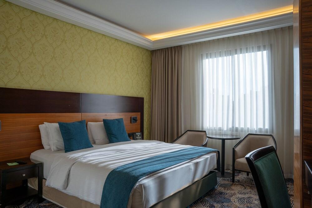 Corp Amman Hotel - Tap to explore photos