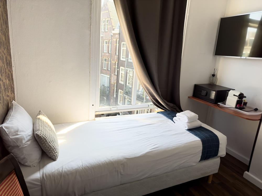 Hotel Amsterdam Inn - Digital Access - Tap to explore photos