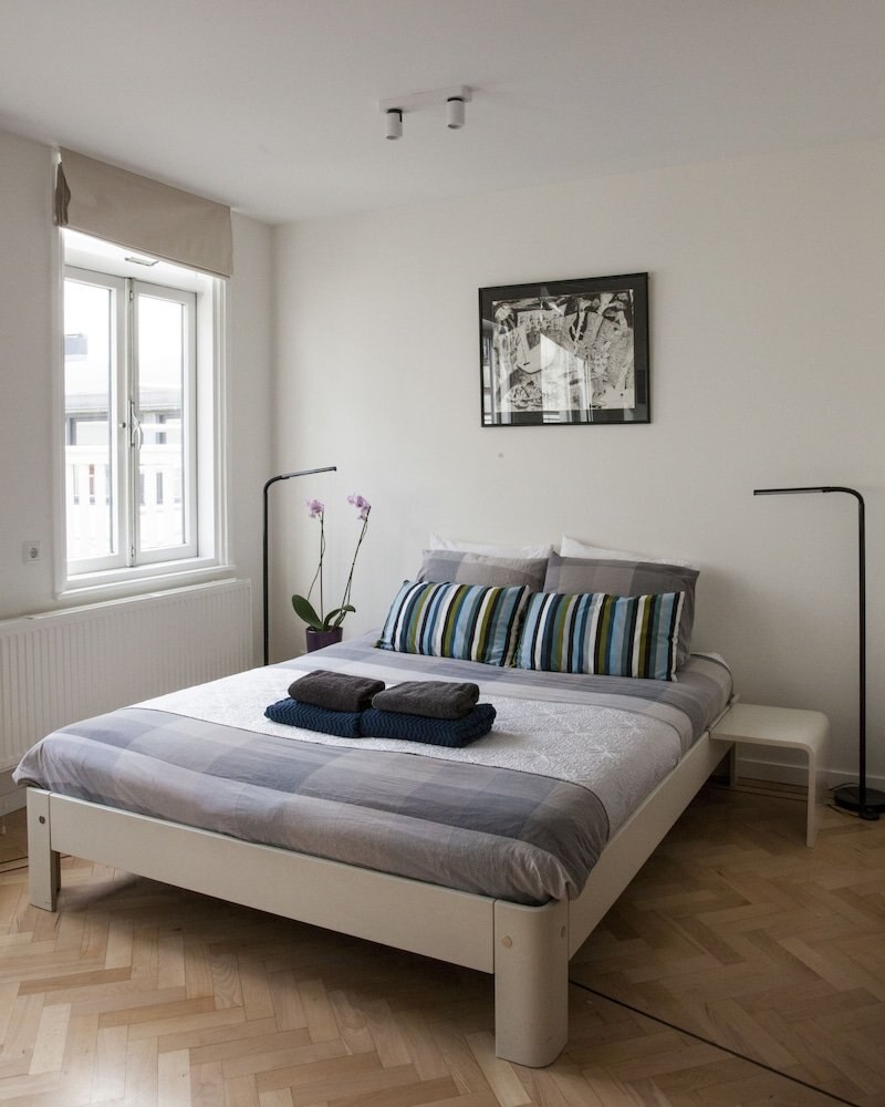 Kuwadro Guesthouse Centrum Room Type - Deluxe Quadruple Room, 1 Queen Bed with Sofa bed, Balcony, City View