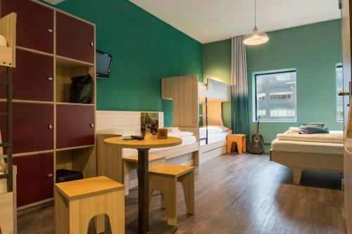 MEININGER Hotel Amsterdam City West - Tap to explore photos
