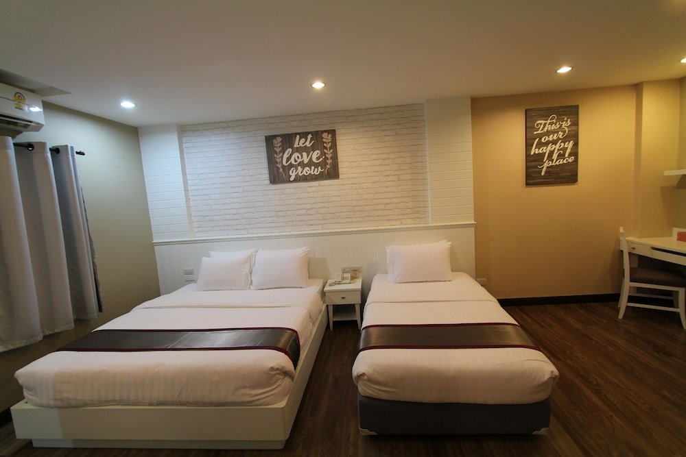 At Residence Suvarnabhumi Hotel Room Type - Family Triple Room, 1 Double and 1 Single