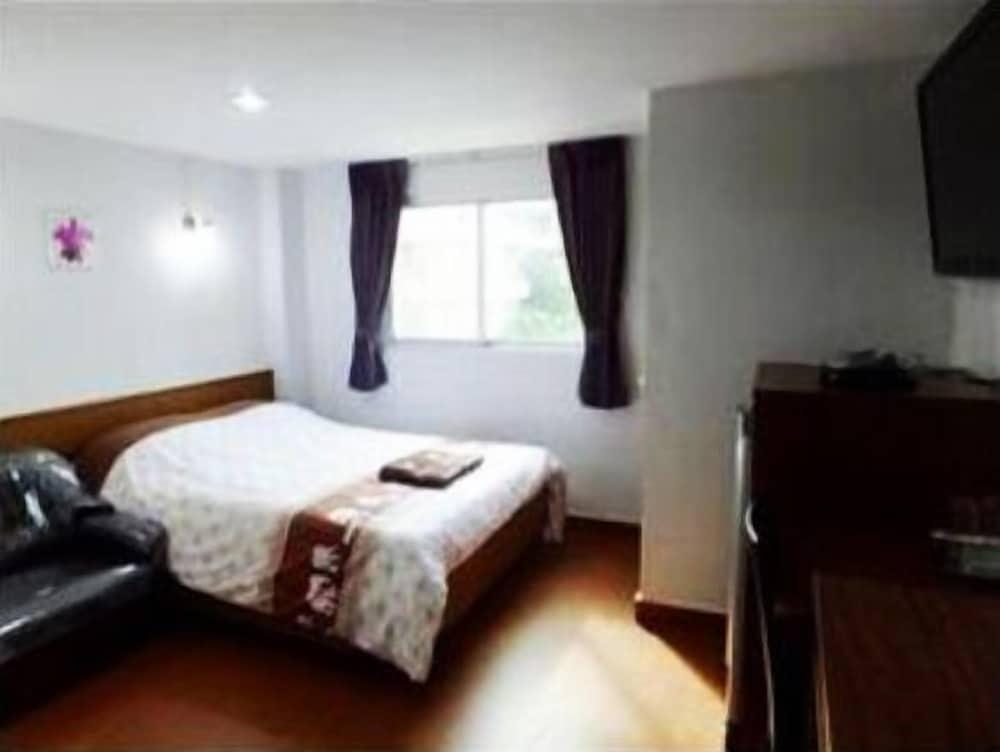 Orchid Inn Room Type - Deluxe Room