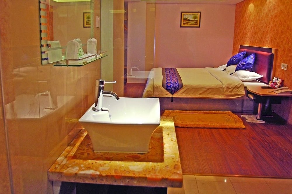 Home Club Hotel Shimao Branch - Tap to explore photos