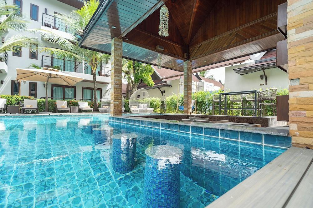 Howard Johnson by Wyndham Phuket Naiyang - Tap to explore photos