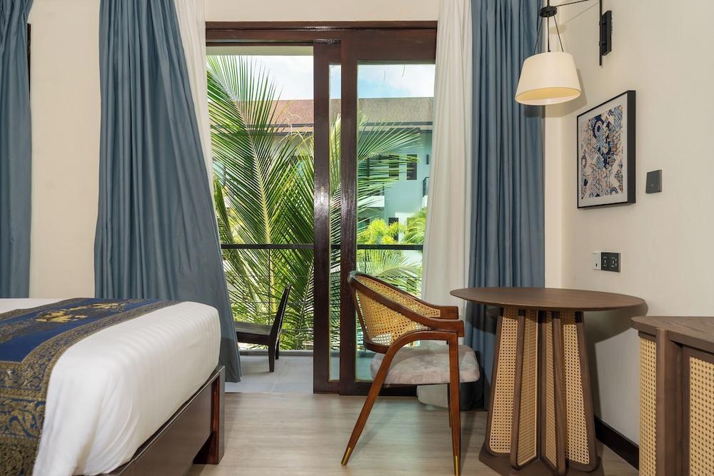 Howard Johnson by Wyndham Phuket Naiyang - Tap to explore photos