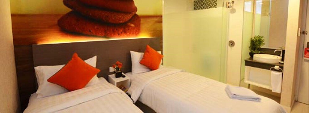 Clay Hotel Jakarta - Tap to explore photos