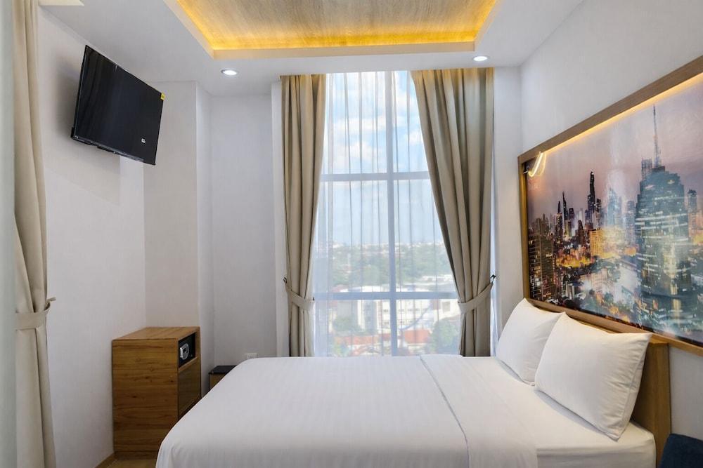 Smart Hotel Thamrin Jakarta - Tap to explore photos