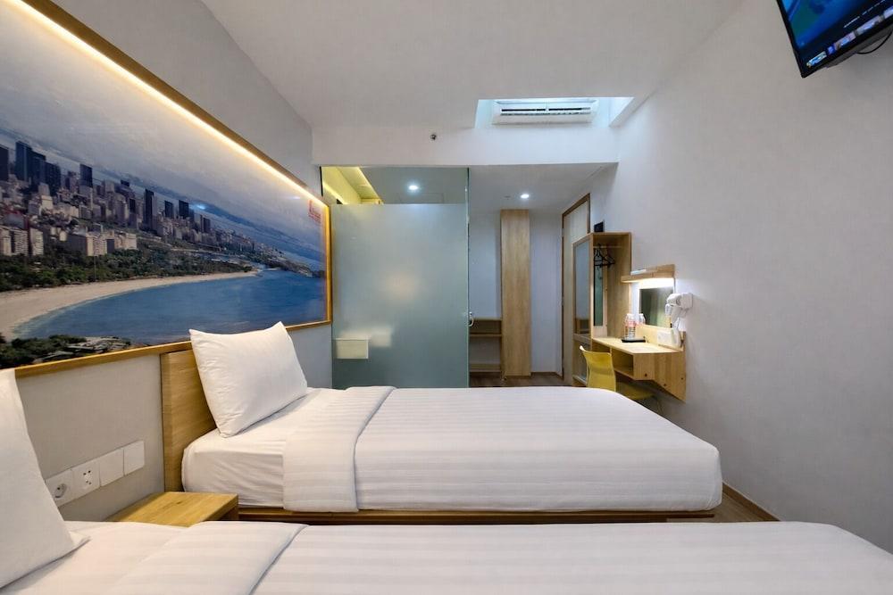 Smart Hotel Thamrin Jakarta - Tap to explore photos