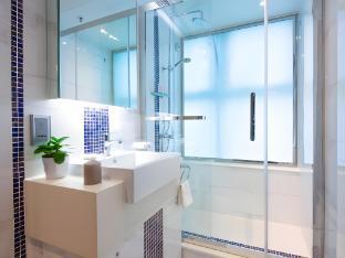 The Bauhinia Hotel Tsim Sha Tsui - Tap to explore photos