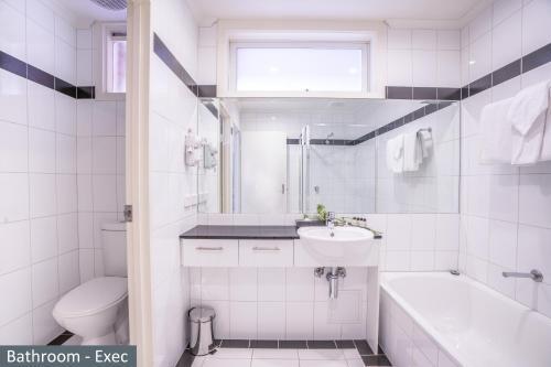 Clocktower Apartment Hotel Room Type - Executive One-Bedroom Apartment