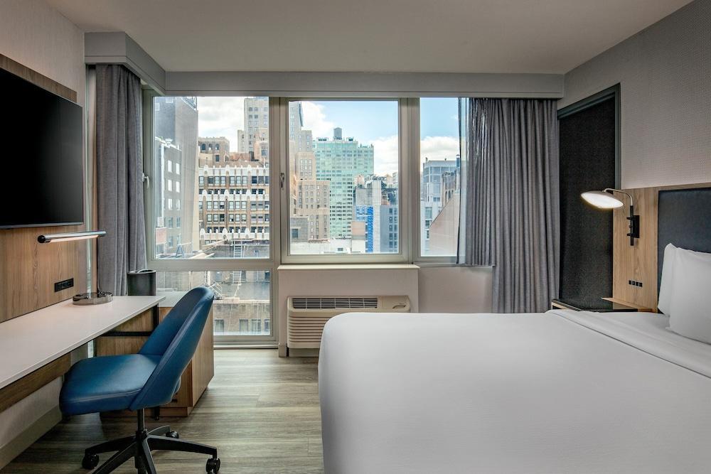 Courtyard by Marriott New York Manhattan/Times Square West - Tap to explore photos