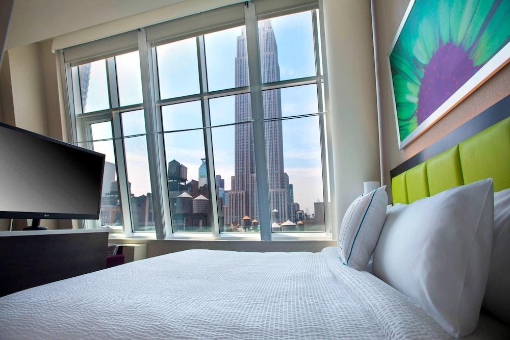 SpringHill Suites by Marriott New York Midtown Manhattan - Tap to explore photos