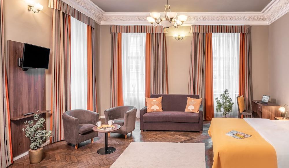 Hotel Palác U Kočků by Adrez Living - Tap to explore photos
