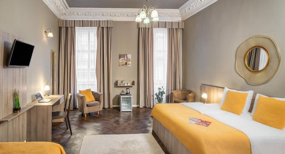Hotel Palác U Kočků by Adrez Living Room Type - Triple Room