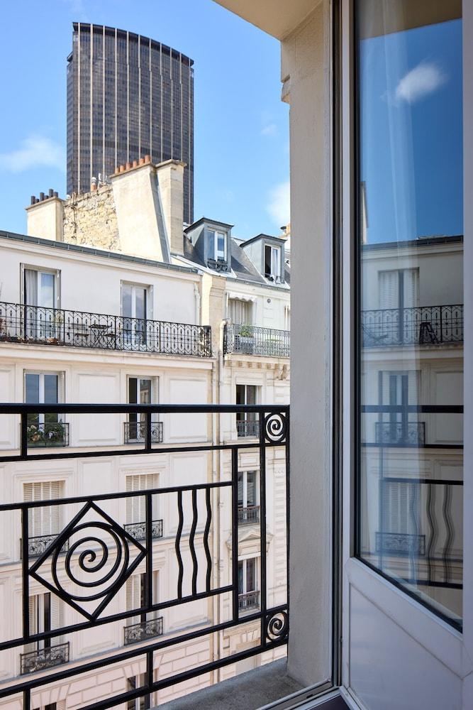 Timhotel Tour Montparnasse - Tap to explore photos