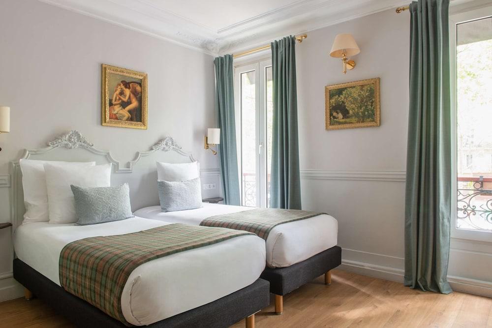 Hotel de la Porte Dorée Room Type - Premium Twin Room