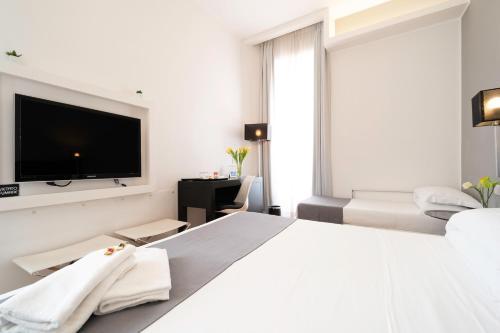 At Home Townhouse - Filiberto Room Type - Triple Room