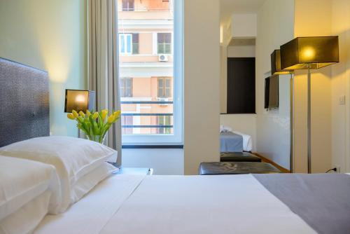 At Home Townhouse - Filiberto Room Type - Deluxe King Room