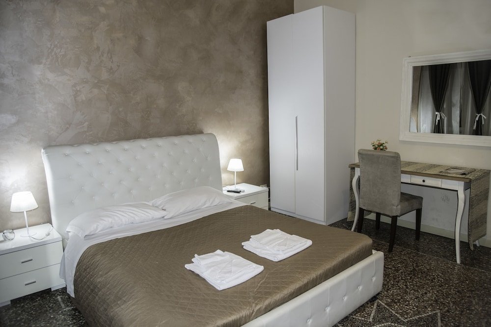 Baldassini Suites - Tap to explore photos