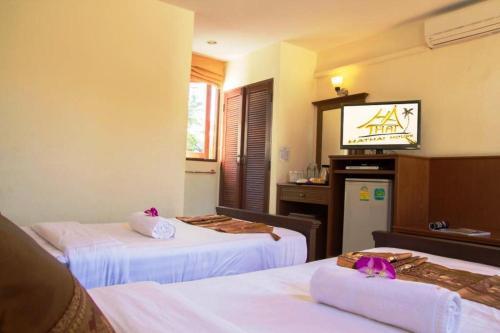 Hathai House Resort - Tap to explore photos