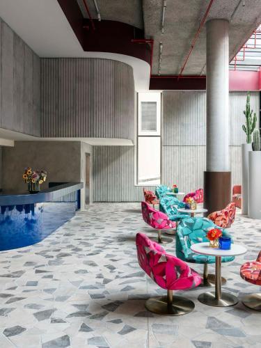 ADGE Hotel & Residences - Tap to explore photos
