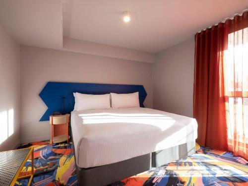 ADGE Hotel & Residences - Tap to explore photos