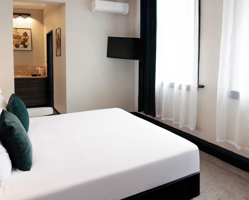 City Budget Hotel Room Type - Standard Window Room