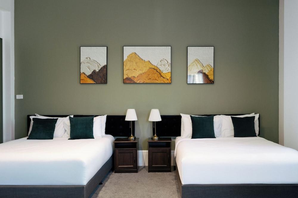 City Budget Hotel Room Type - Premium Family Room with Balcony