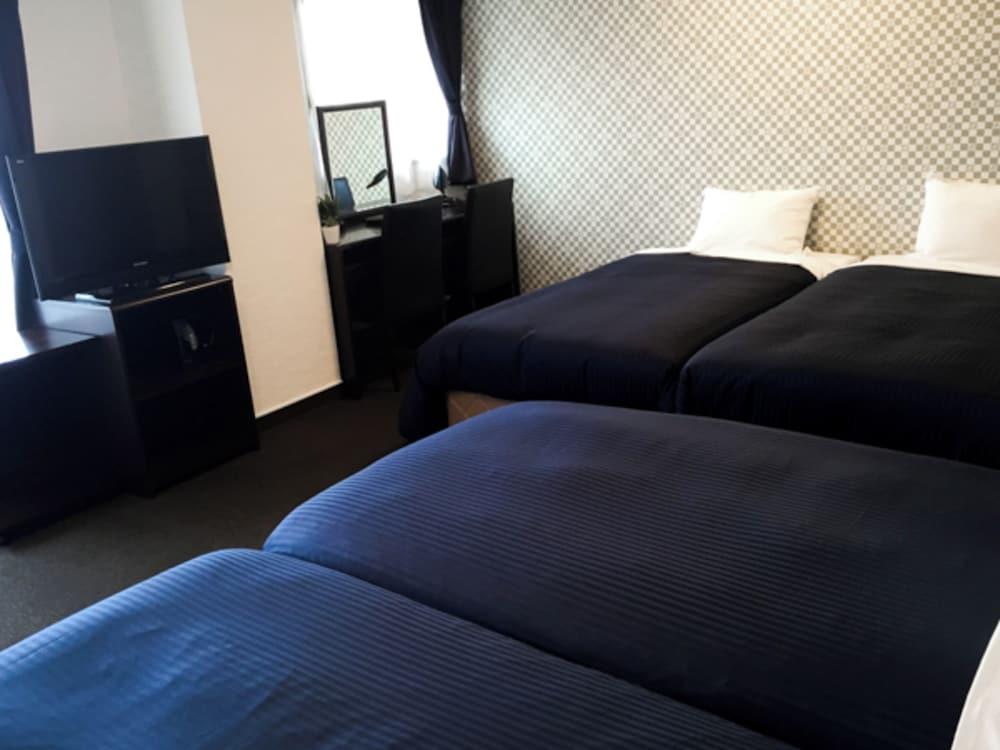Hotel Livemax Budget Fuchu - Tap to explore photos