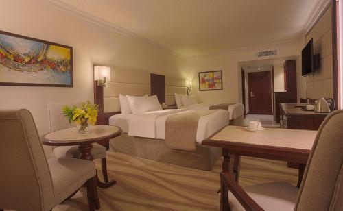 Landmark Amman Hotel & Conference Center - Tap to explore photos