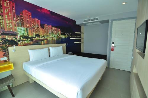 The AIM Patong Hotel - Tap to explore photos