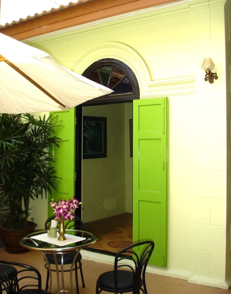 The Bang Khun Phrom Suites - Tap to explore photos