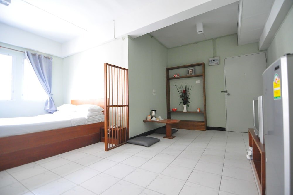 The Living Room Serviced Apartment - Tap to explore photos