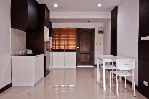 Victorian Samui Condominium - Tap to explore photos