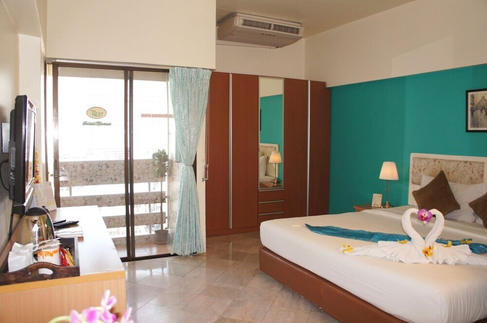 The Nest Serviced Apartment - Tap to explore photos