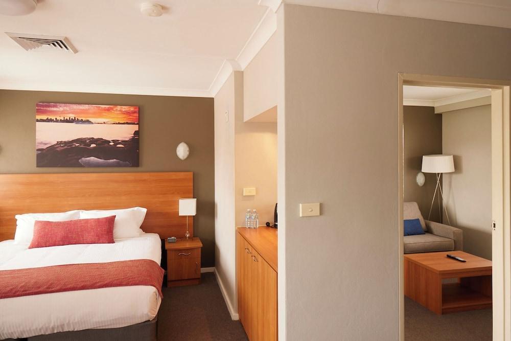 Ramada Hotel & Suites Sydney Cabramatta - Tap to explore photos