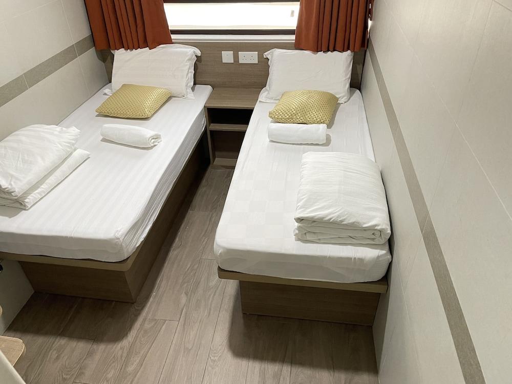 Kong Hing Guest House - Tap to explore photos