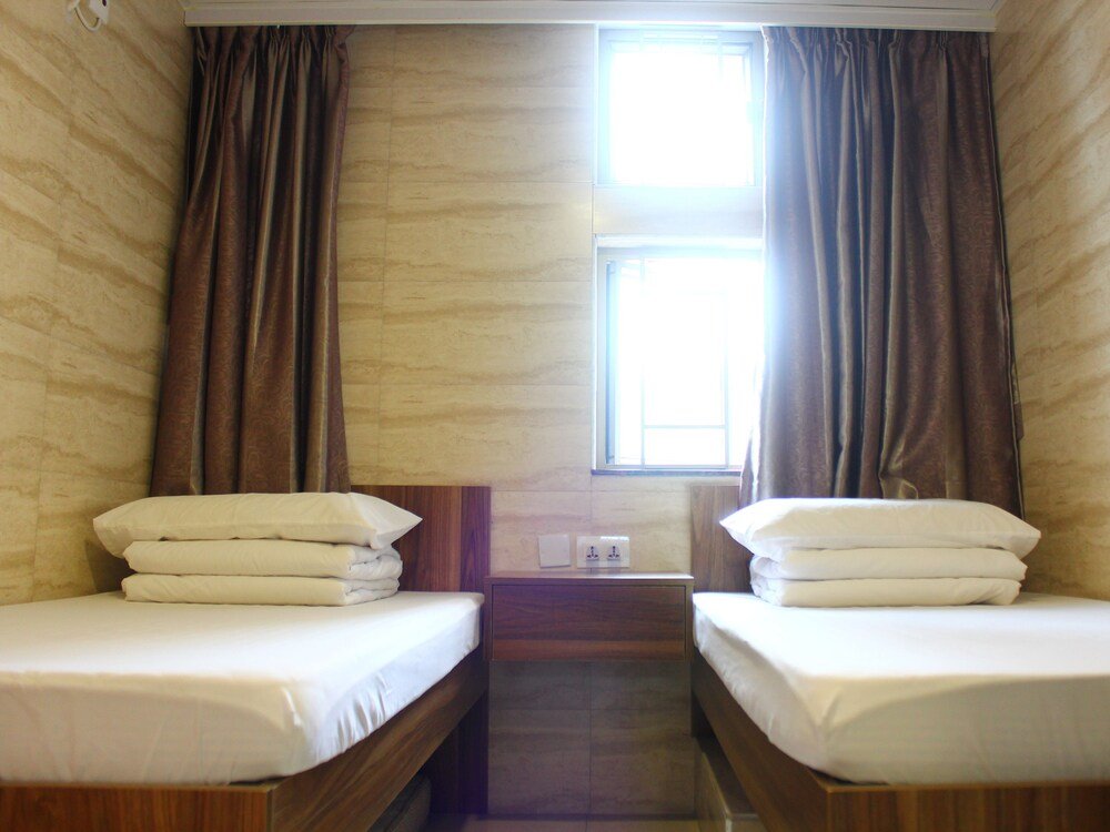 Kong Hing Guest House - Tap to explore photos