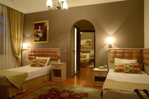 Tashkonak Studio Suites Room Type - Three-Bedroom Family Suite Tashkonak Studio Suites Room Type - Three-Bedroom Family Suite