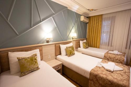 Tashkonak Studio Suites - Tap to explore photos
