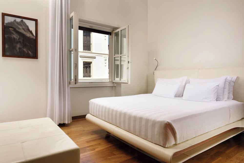 Palazzo Montemartini Rome, A Radisson Collection Hotel - Tap to explore photos