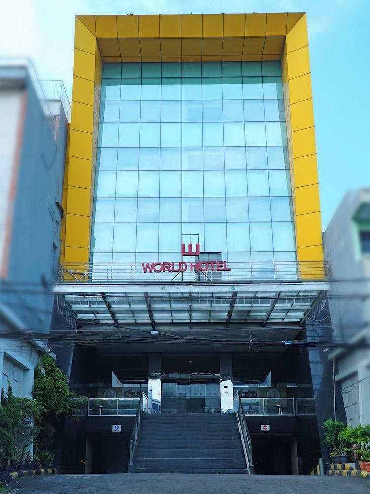 World Hotel - Tap to explore photos