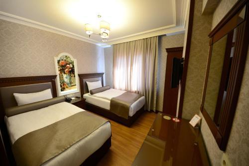 Grand Bazaar Hotel - Tap to explore photos