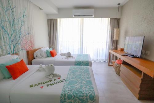 Bandara Beach Resort Phuket - Tap to explore photos