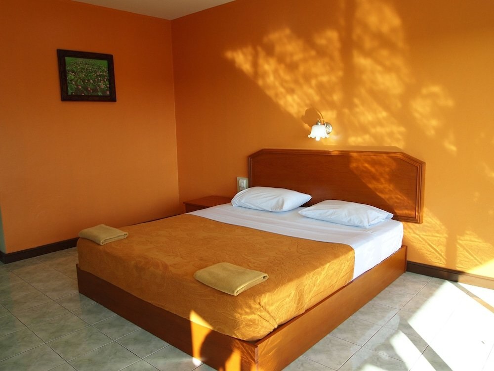 Karon Village Hotel - Tap to explore photos