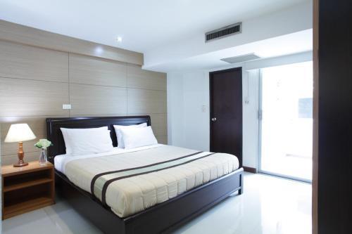 Nanatai Suites - Tap to explore photos