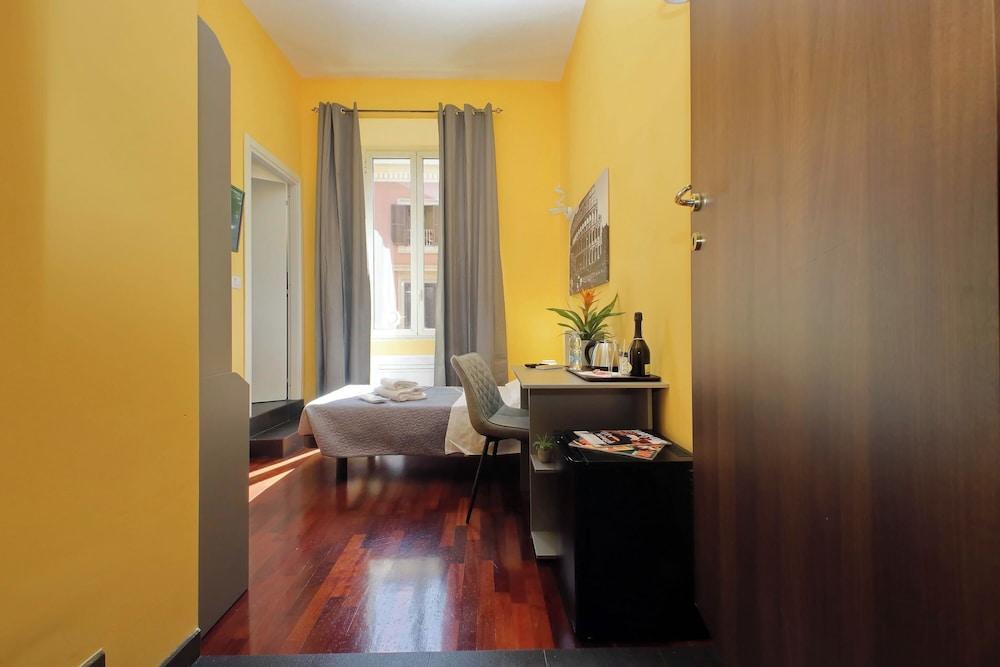 Porta Pia Comfy Rooms - Tap to explore photos