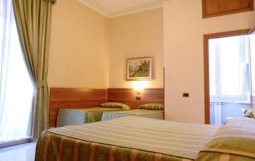 Hotel Teti - Tap to explore photos